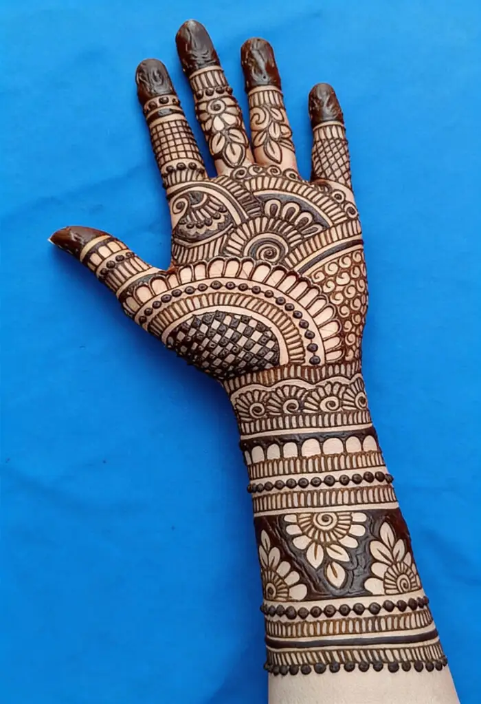 Elegant Full Hand Mehndi Design with Geometric & Floral Patterns