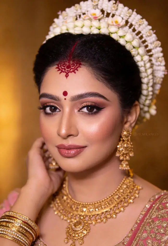 Traditional South Indian Bridal Makeup with Jasmine Gajra & Gold Jewelry