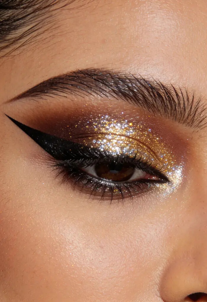 Golden Glitter Smokey Eye with Bold Winged Eyeliner Glam Look