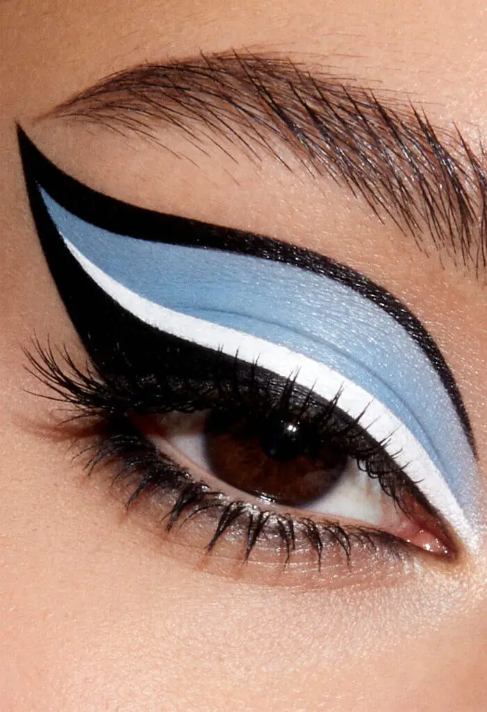 Bold Blue & White Cut Crease Eye Makeup with Graphic Winged Eyeliner