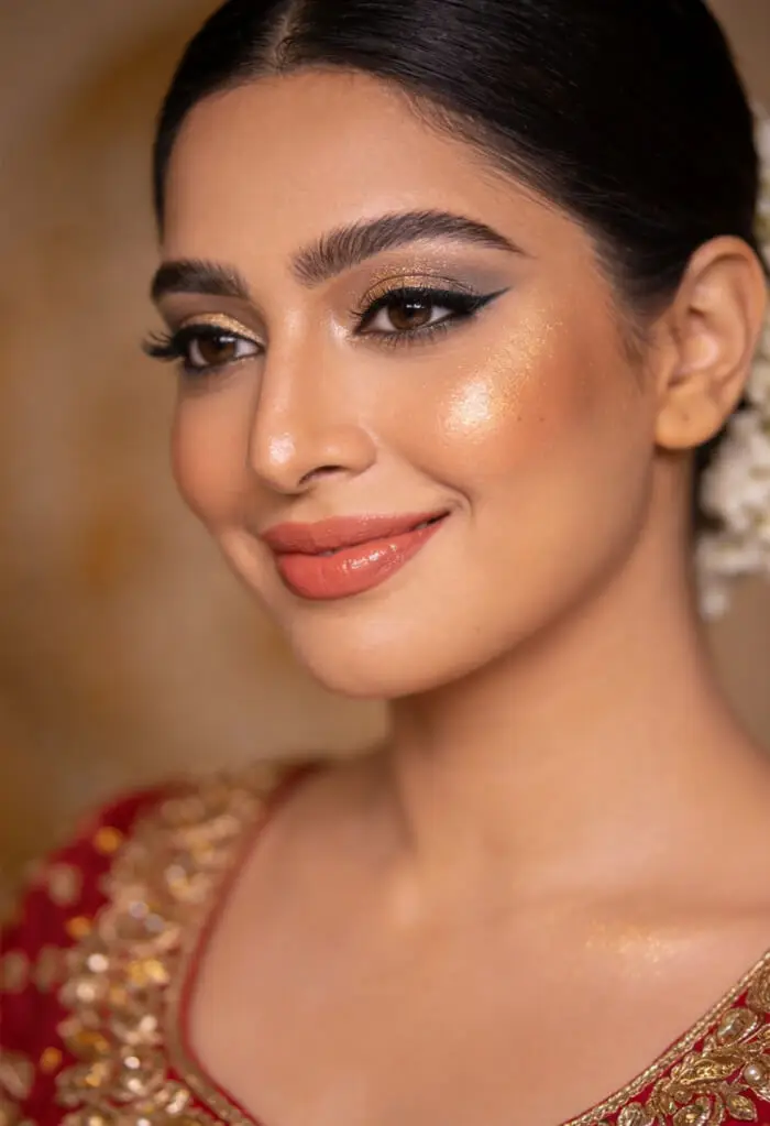 Golden Shimmer Bridal Makeup Look with Bold Winged Eyeliner