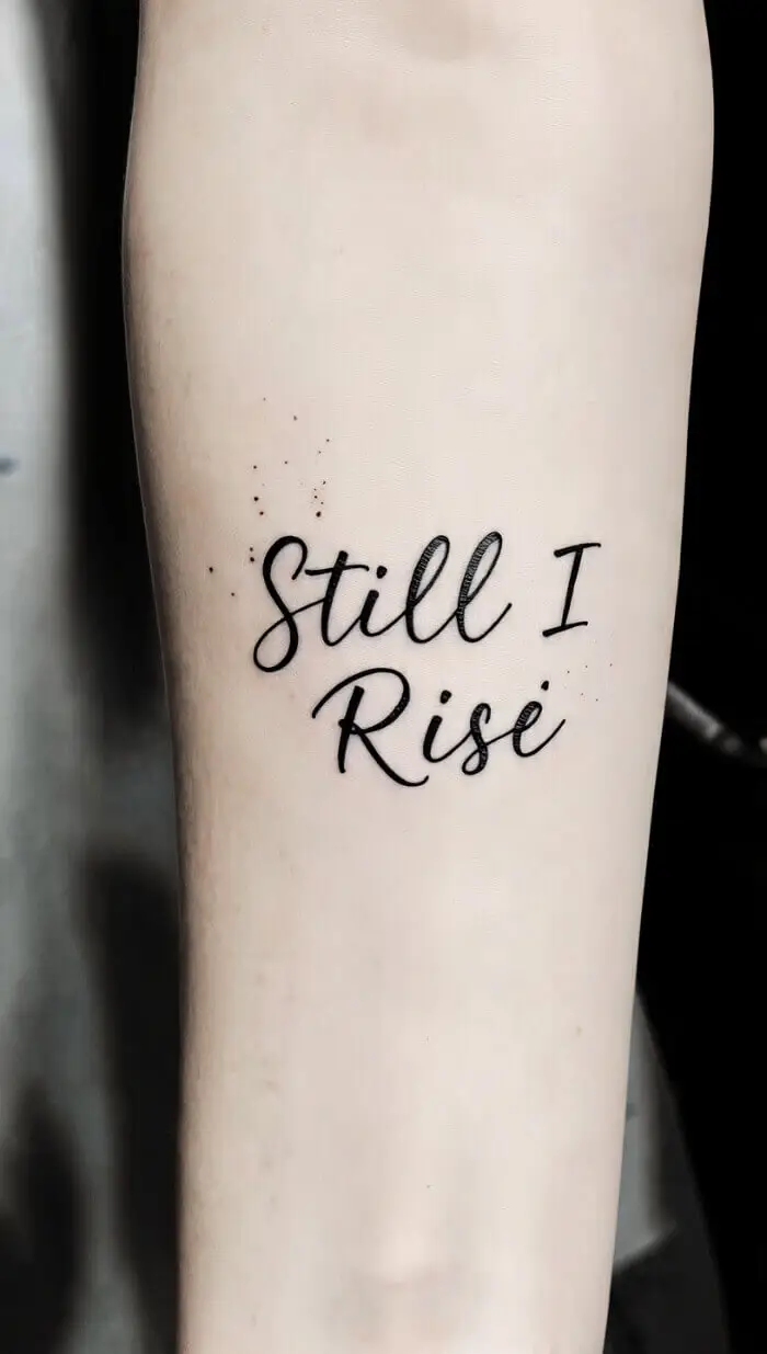 "Still I Rise" Quote Tattoo – Elegant Script Forearm Ink