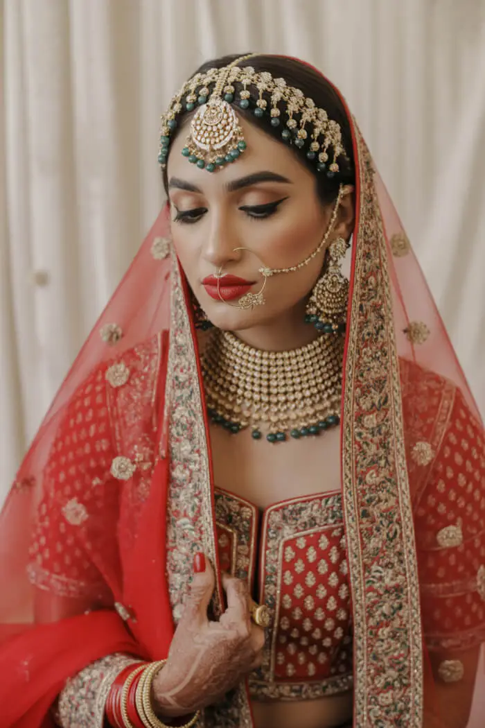 Beautiful Indian Bridal Nude Makeup Look With Gold Jewelry