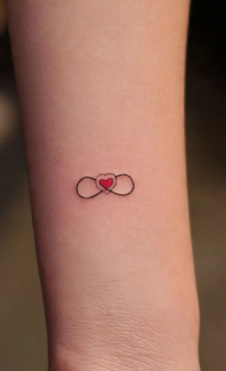 Small Infinity Heart Tattoo – Minimalist Love Symbol with Red Heart