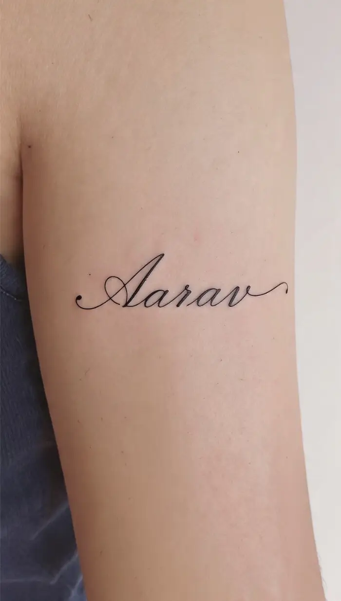 Minimal "Aarav" Name Tattoo Design in Elegant Cursive Script