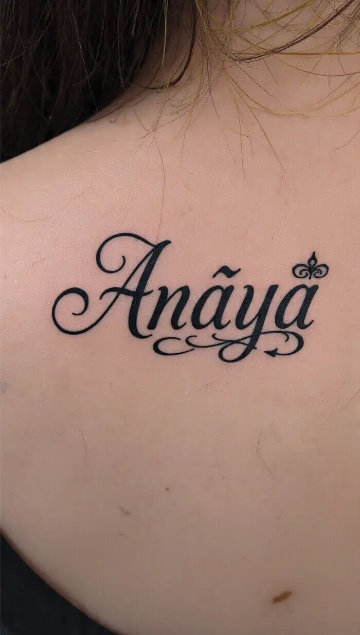 Elegant "Anaya" Name Tattoo Design With Calligraphy Script on Collarbone