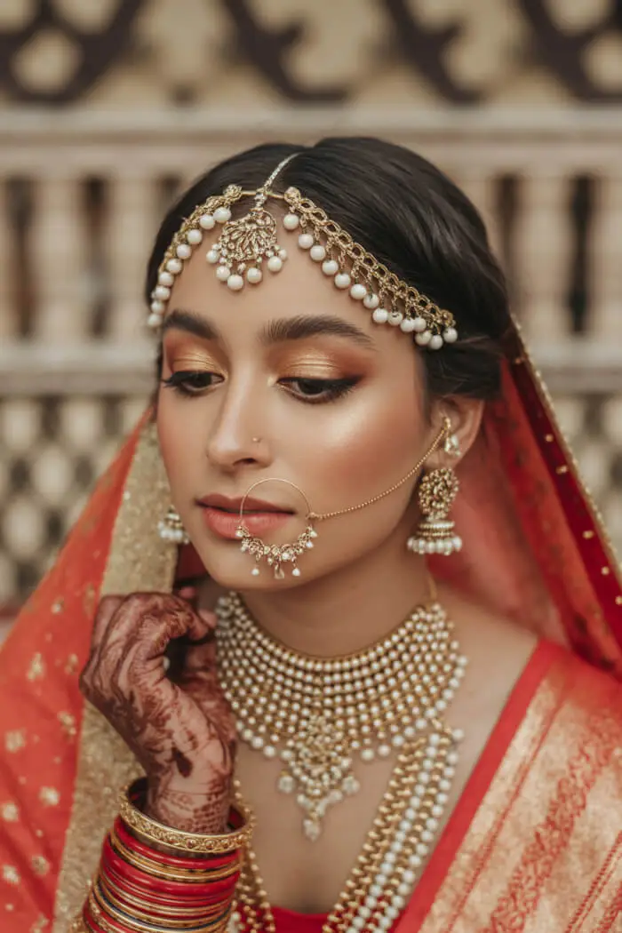 Traditional Indian Bridal Makeup Look with Soft Gold Eyes & Nude Lips