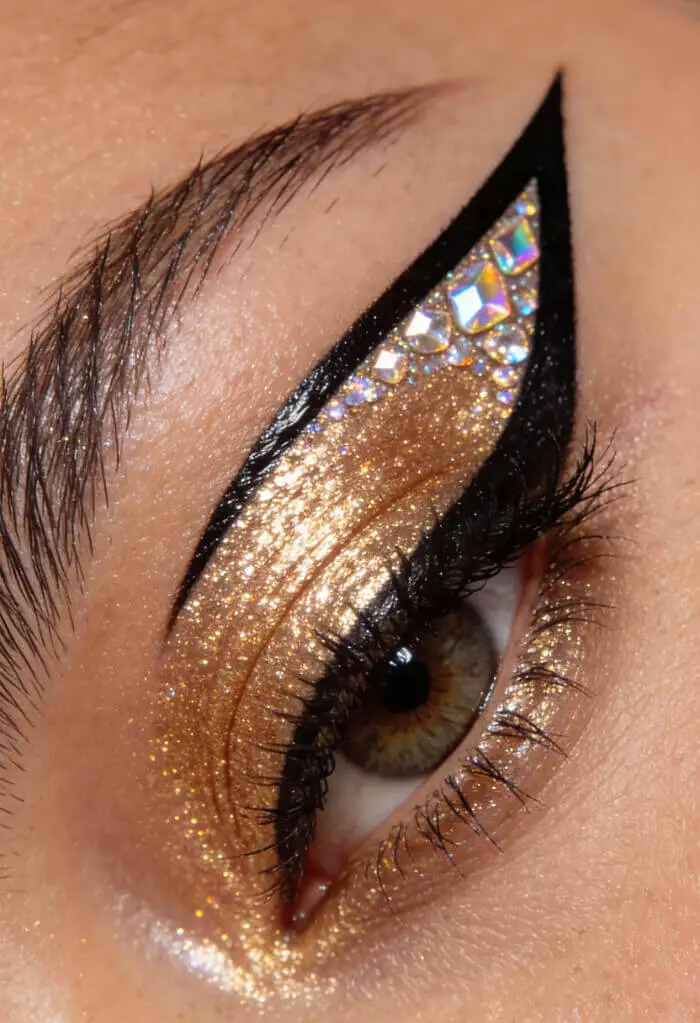 Golden Glitter Winged Eye Makeup with Crystal Liner Design