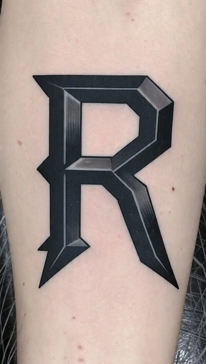 Bold 3D Letter R Tattoo Design – Geometric Black Ink Initial Tattoo