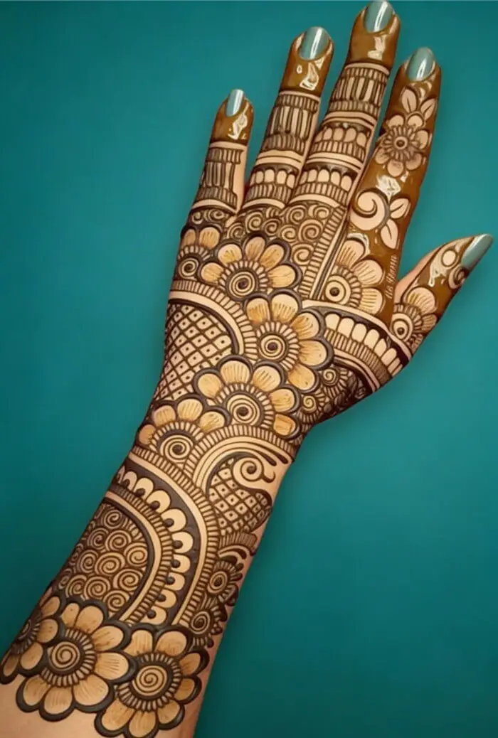 Elegant Floral Back Hand Mehndi Design with Intricate Patterns